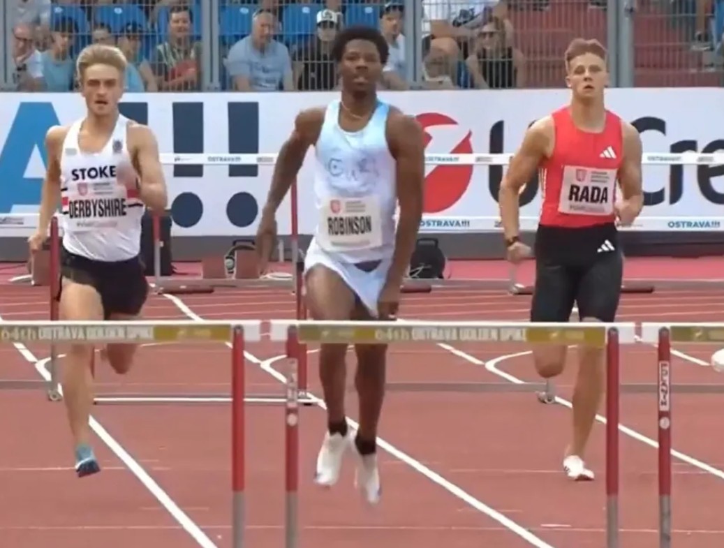 Chris Robinson Hurdles Video and Wardrobe Malfunction